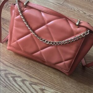 Coral bag with gold details